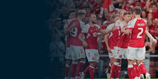 Football player with soccer ball.